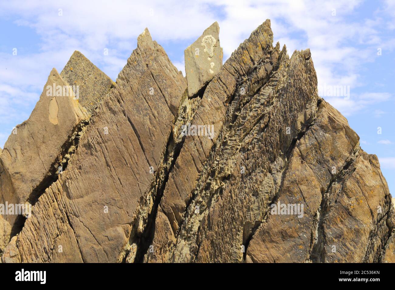 Rocks on the beach during low tide in seaside town of Ilfracombe on the ...