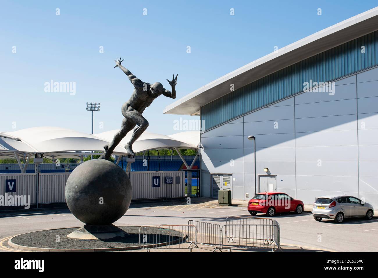 Commonwealth Games statue The Runner at the Etihad football stadium Sportcity Manchester UK Stock Photo