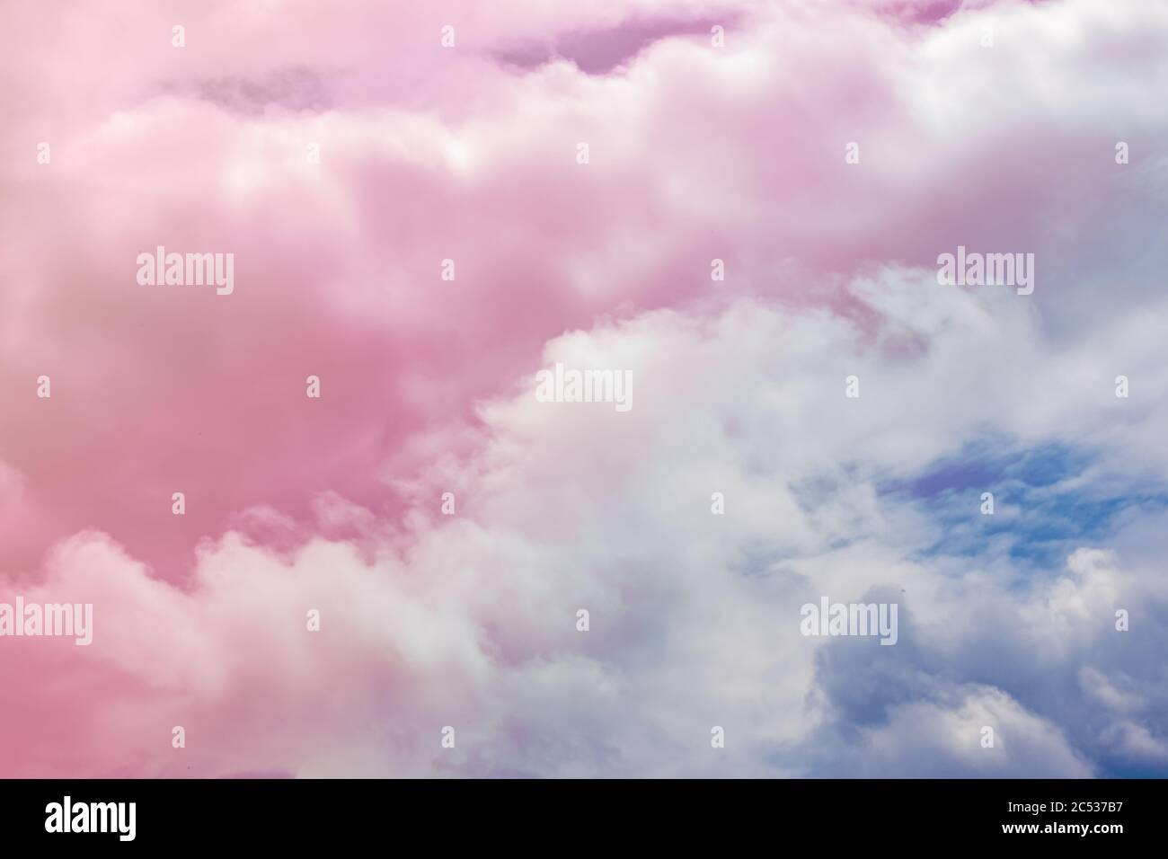 Fluffy White Clouds In A Bright Blue Sky Dramatic And Colorful Cloud Background With Mixed Pastels Stock Photo Alamy