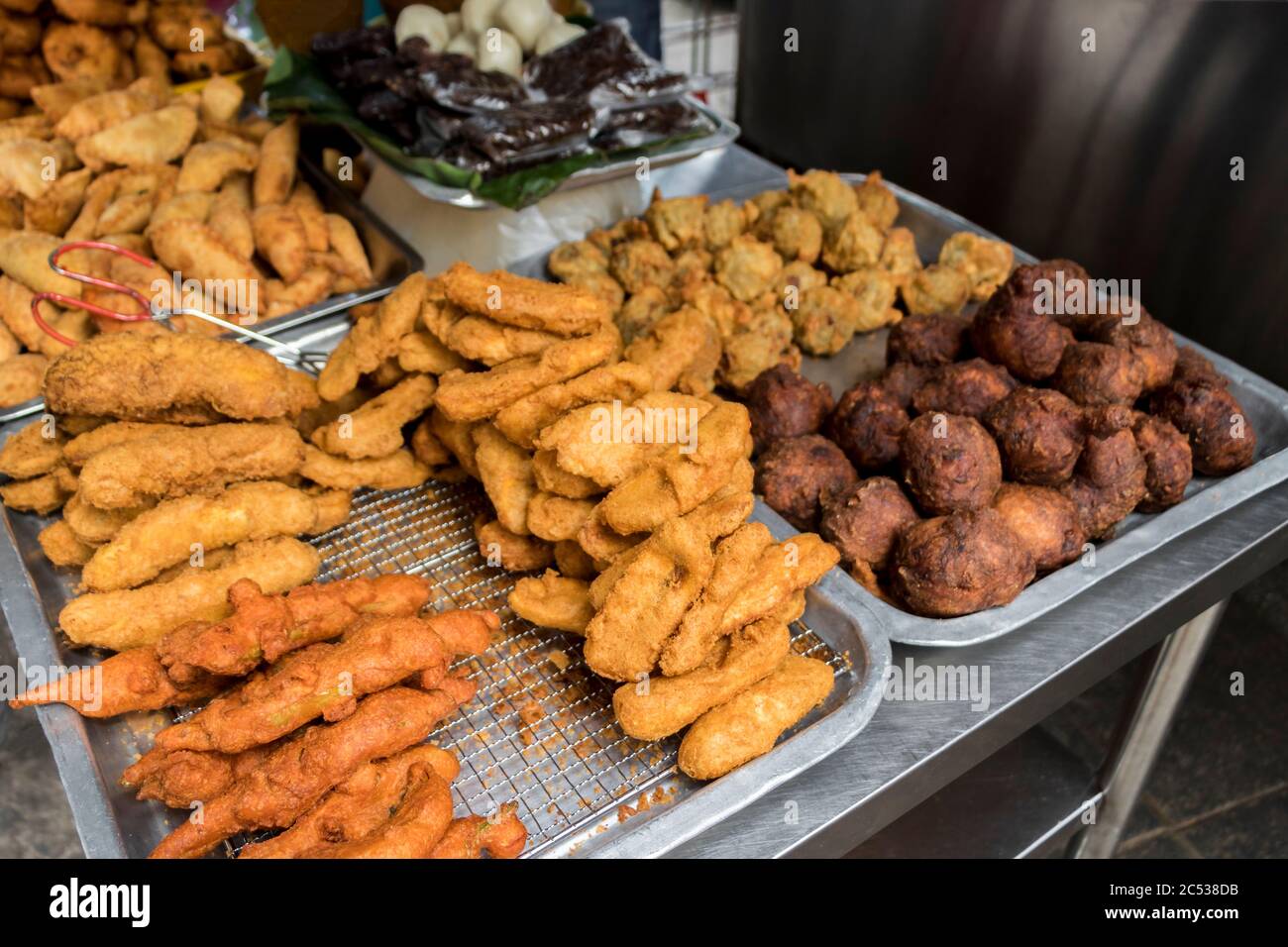 Indian breakfast traditional samosa dosa vadai brown balls deep fried