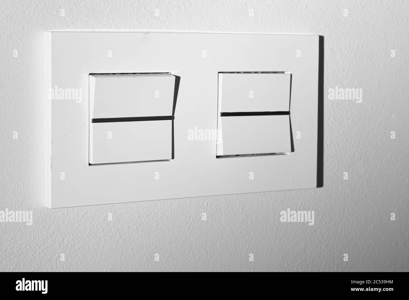 Light switch with two button on white background. Stock Photo