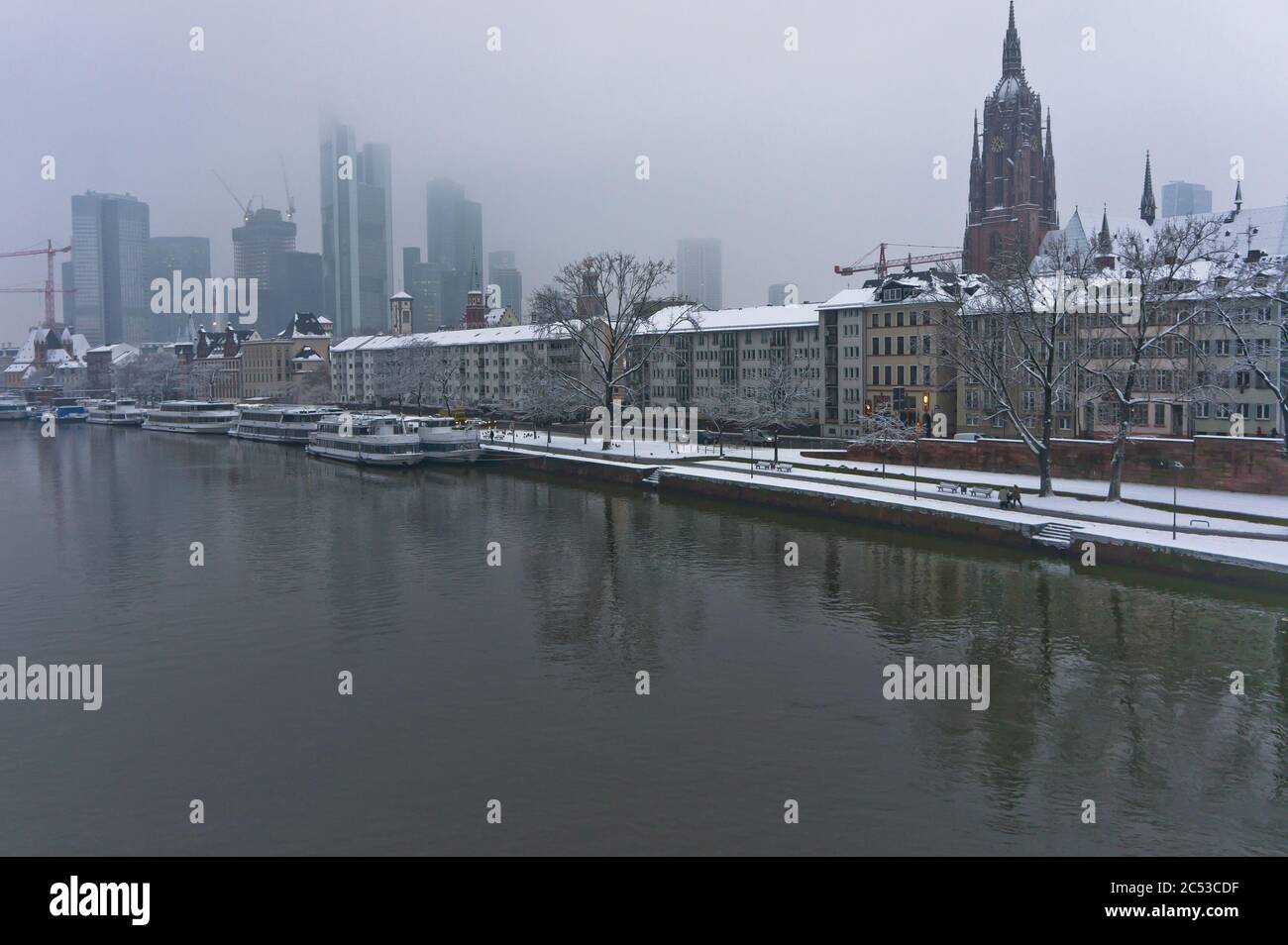 Snowy day, city view from river Rhine, Frankfurt, Germany Stock Photo