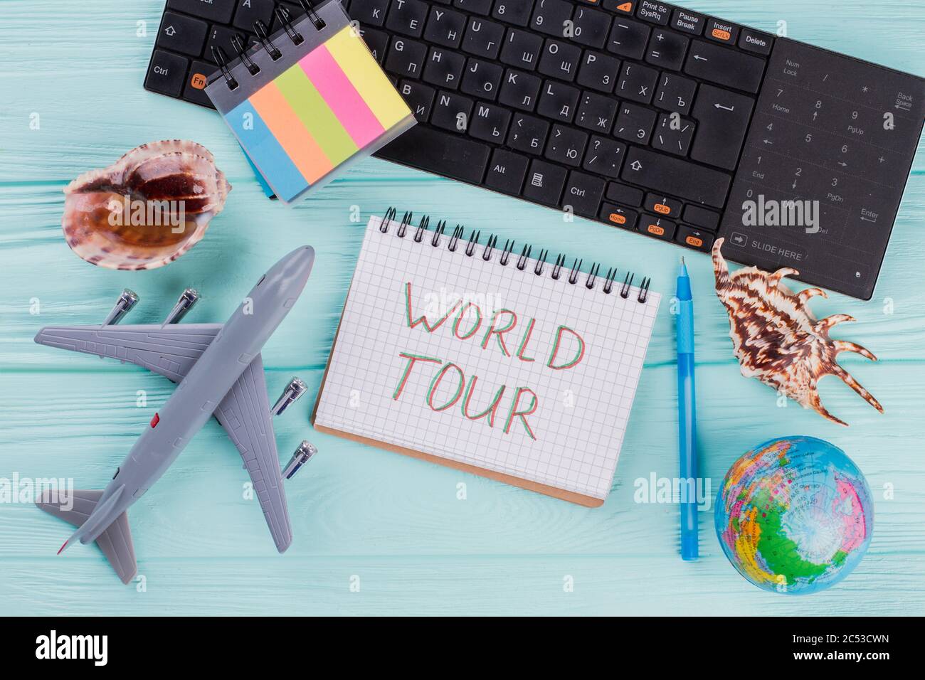 Set of various accessories airplane seashells globe for vacation travel