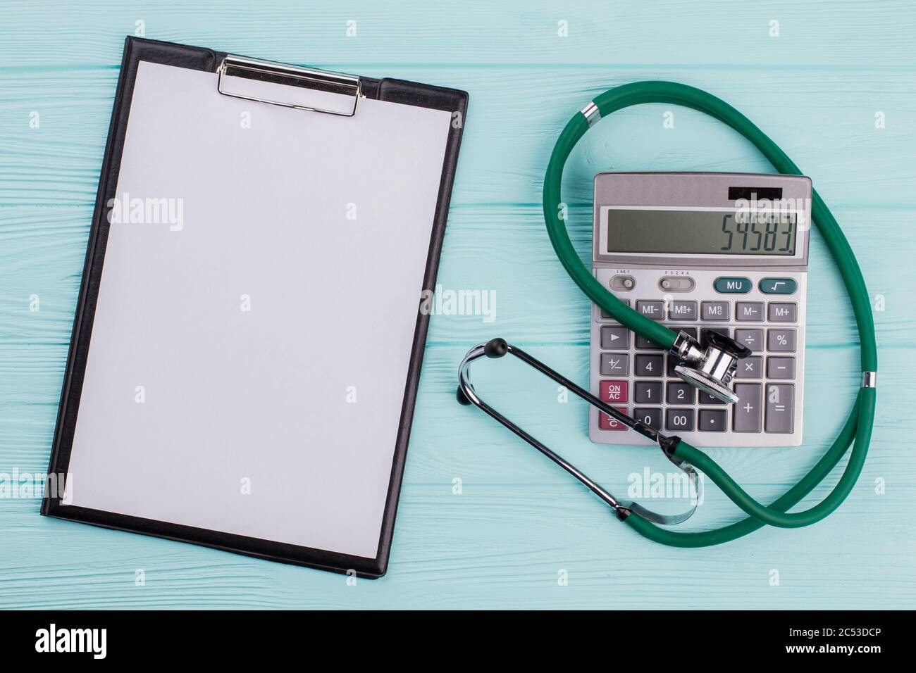 Concept cost of healthcare consist of stethoscope calculator Stock