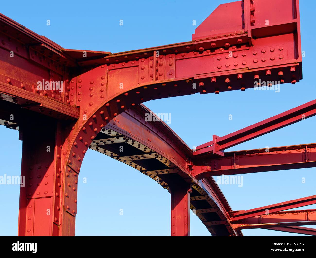 Riveted steel girders of a bridge in Hamburg. Stock Photo