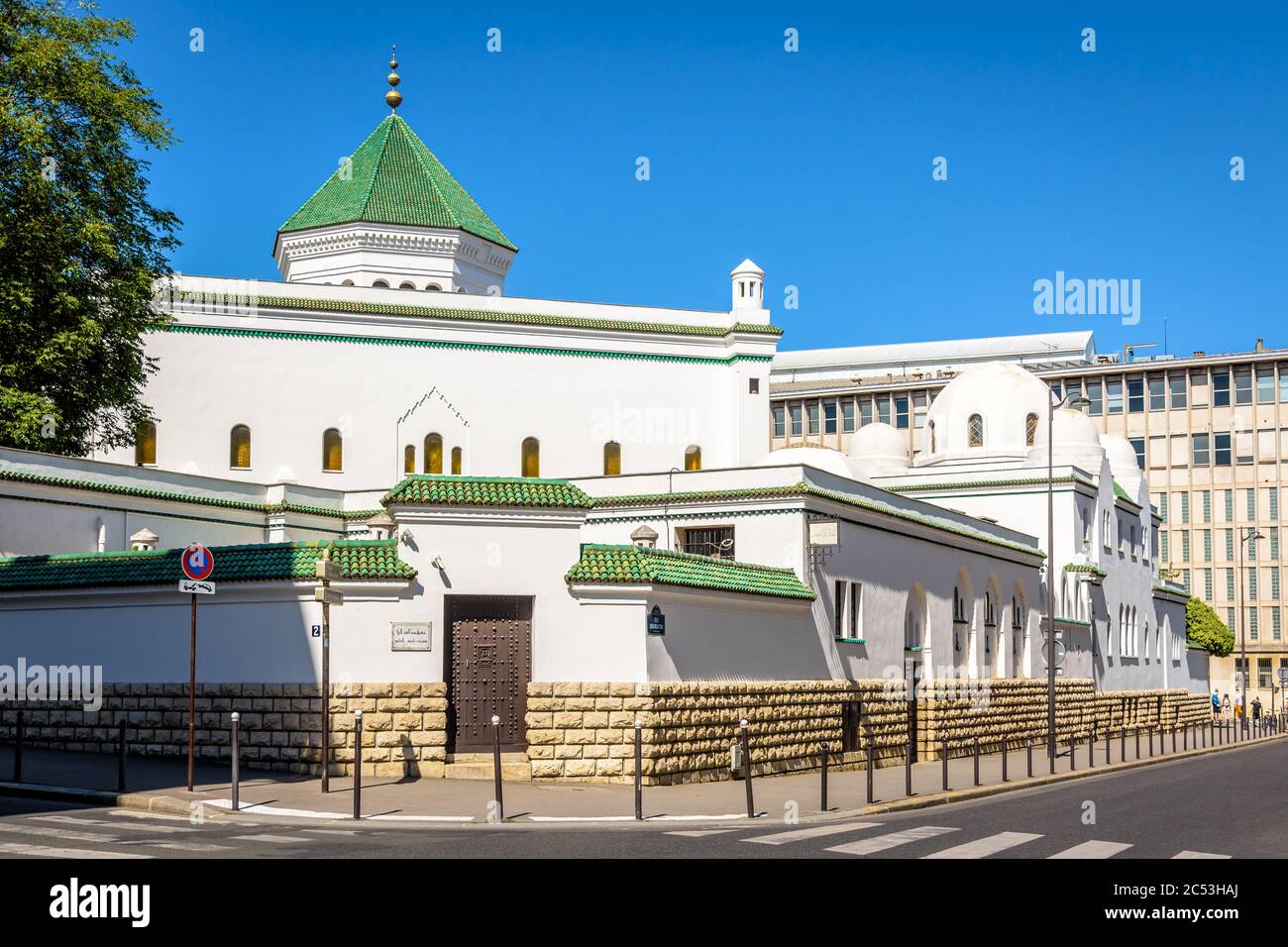 Western side of the Great Mosque of Paris with the prayer hall topped by a dome with green tiles. Stock Photo