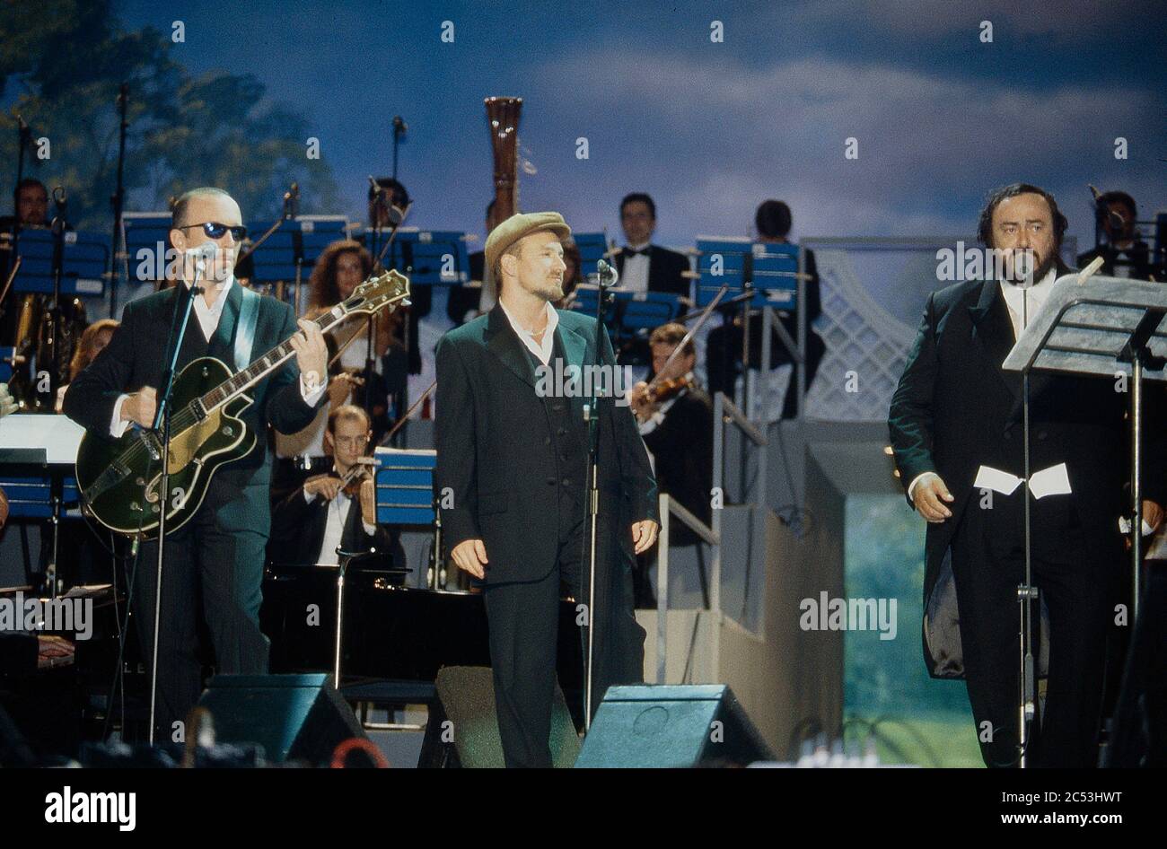 Pavarotti & Friends concert in Modena,Italy 1995: Bono and and The Edge of U2 performing Stock Photo