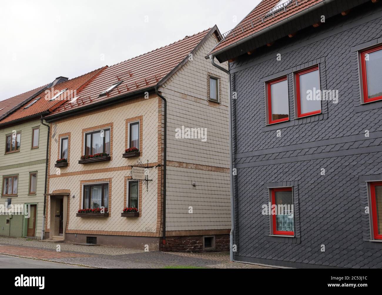 typical slated facades of old houses in thuringia/Germany Stock Photo