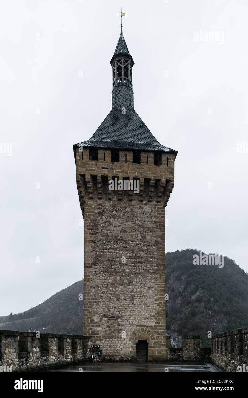 Tower of a medieval castle on a very cloudy day Stock Photo - Alamy