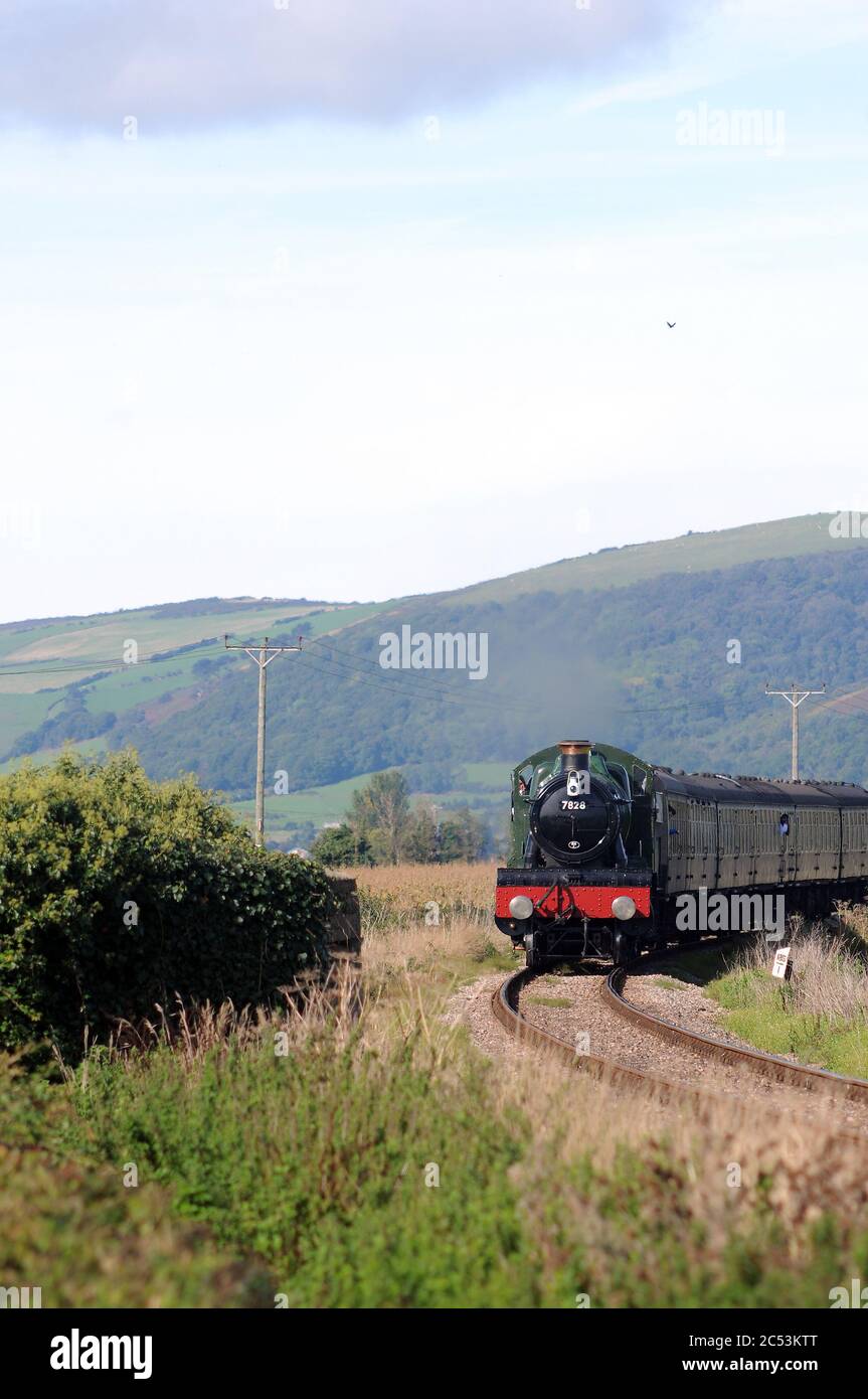 'Odney Manor' approaching Blue Anchor with a Minehead - Bishop's Lydeard train. Stock Photo