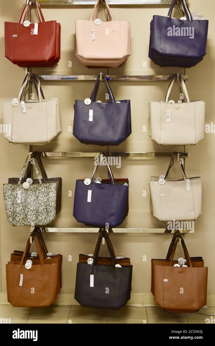 hanging bags helps strap position make sense. | Bags, Bag display, Leather  travel bag