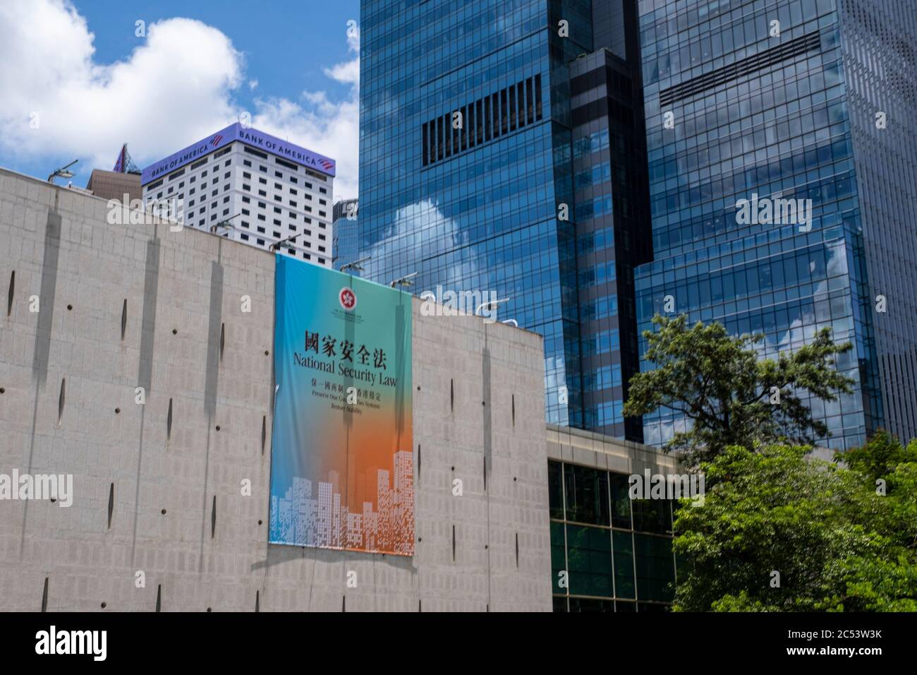 Hong Kong, Hong Kong. 30th June, 2020. A government sponsored advertisement promoting the new national security law display on a building in Hong Kong. Credit: Chan Long Hei/SOPA Images/ZUMA Wire/Alamy Live News Stock Photo