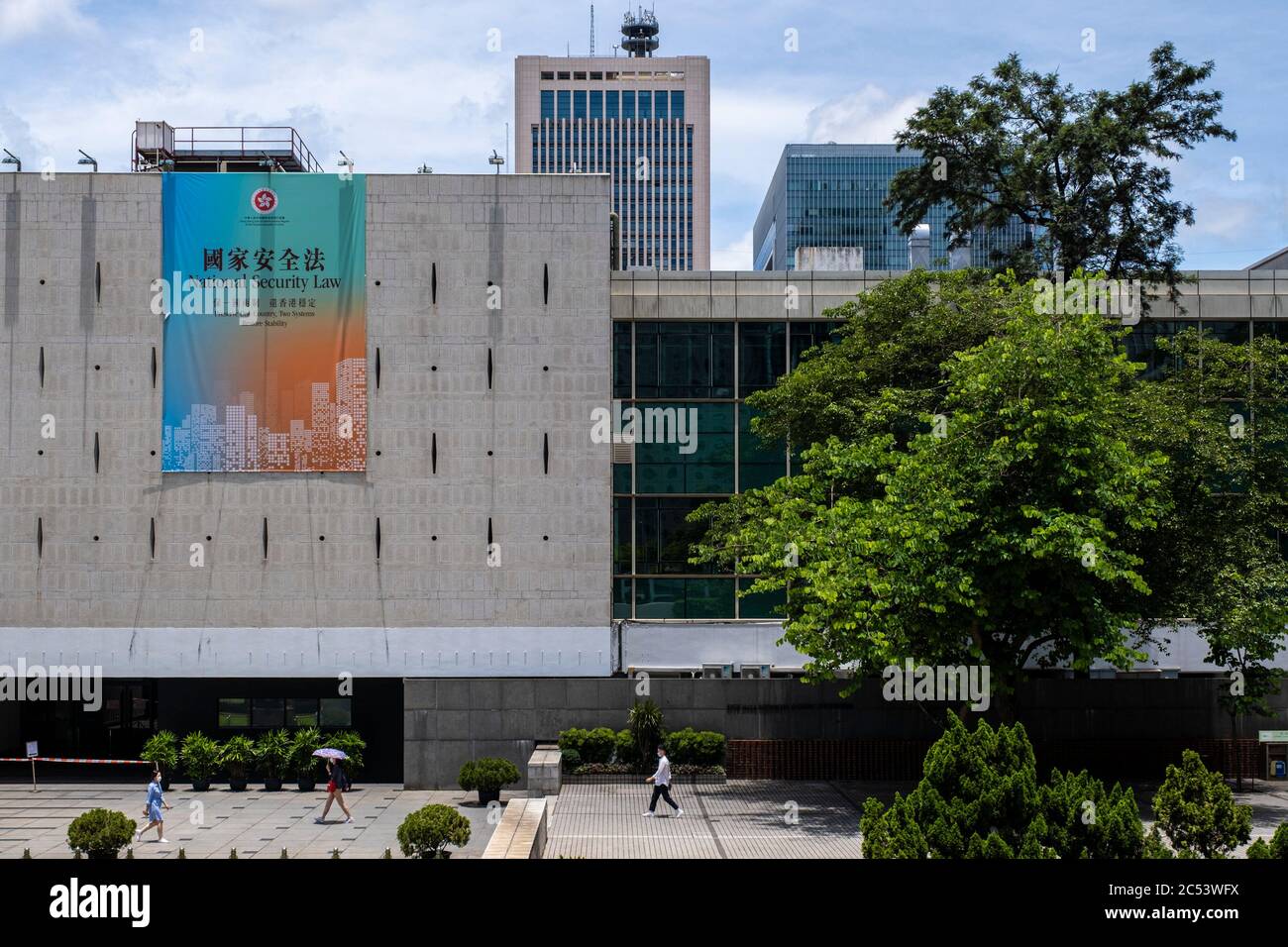 Hong Kong, Hong Kong. 30th June, 2020. A government sponsored advertisement promoting the new national security law display on a building in Hong Kong. Credit: Chan Long Hei/SOPA Images/ZUMA Wire/Alamy Live News Stock Photo
