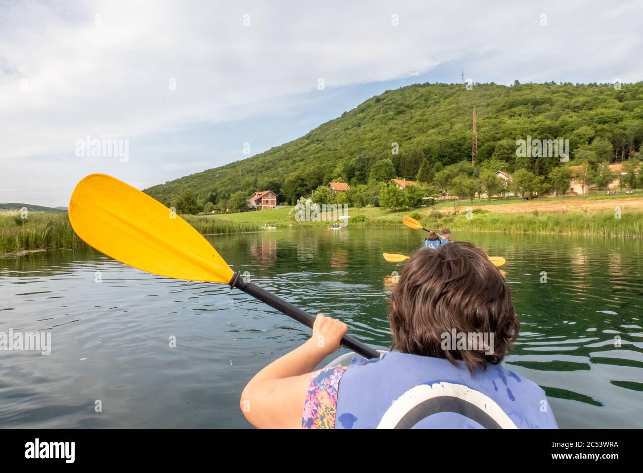 Kayaking on the calm clear waters of the river Gacka, Otocac, Lika, Croatia Stock Photo