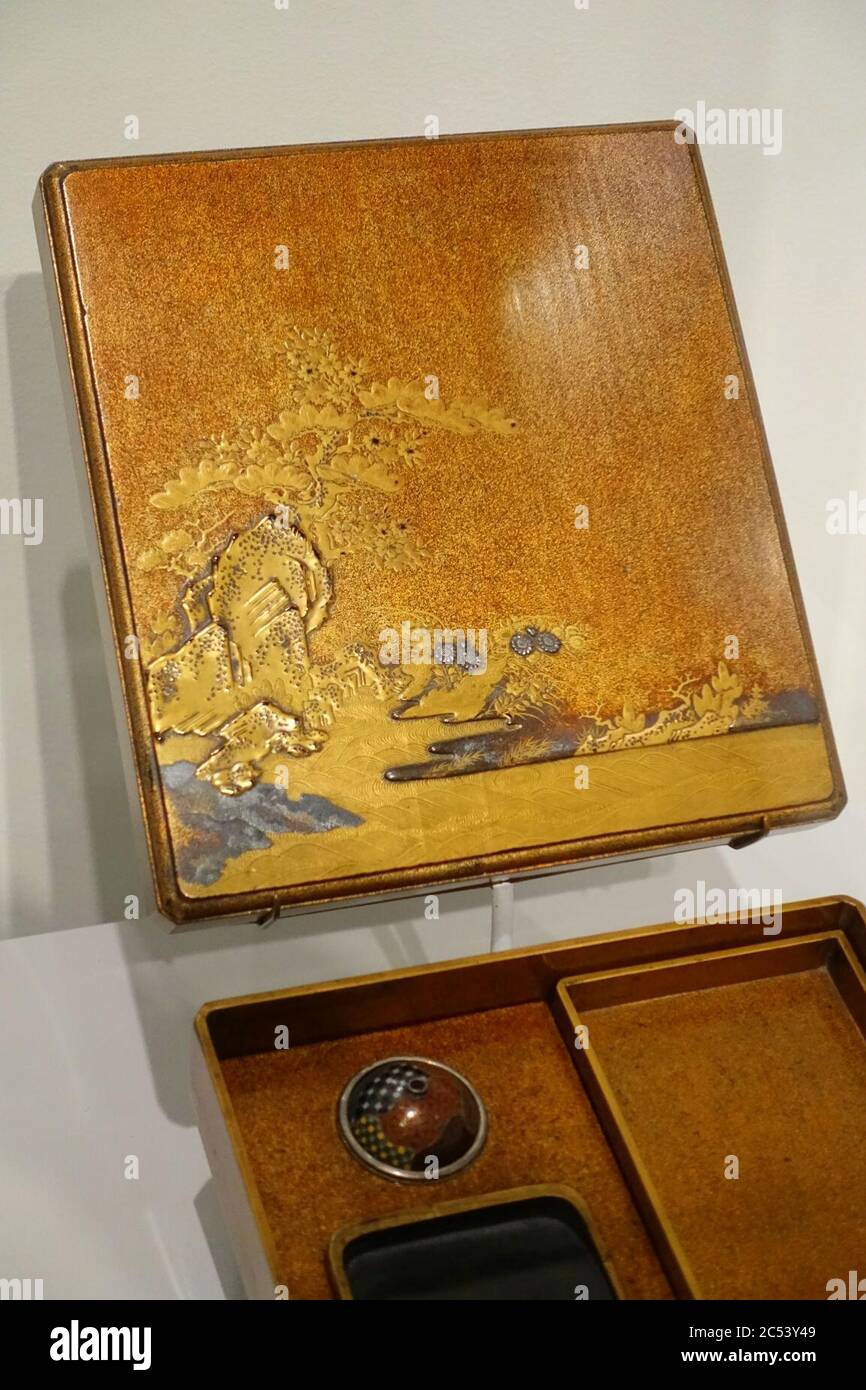 Inkstone box (suzuribako) with intertwined pine and cherry tree design, Japan, Edo period, early 1600s AD, lacquer on wood, silver, stone, metal, enamel Stock Photo