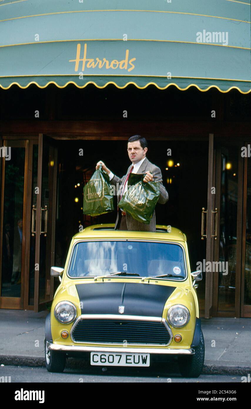 Rowan Atkinson filming Mr Bean at Harrods with Mel Smith 1996 Stock Photo