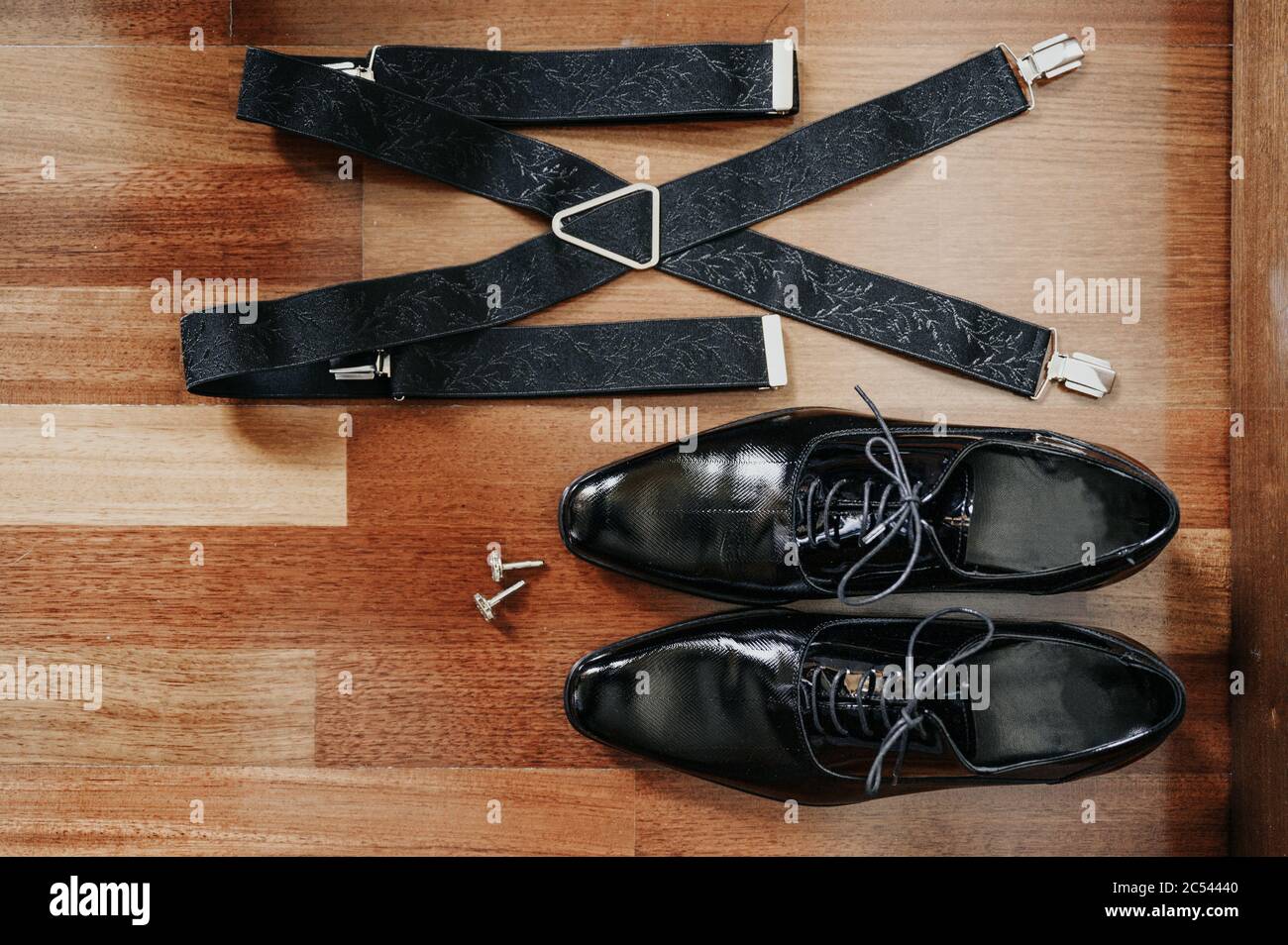 Classic leather shoes with accessories for a wedding day look Stock