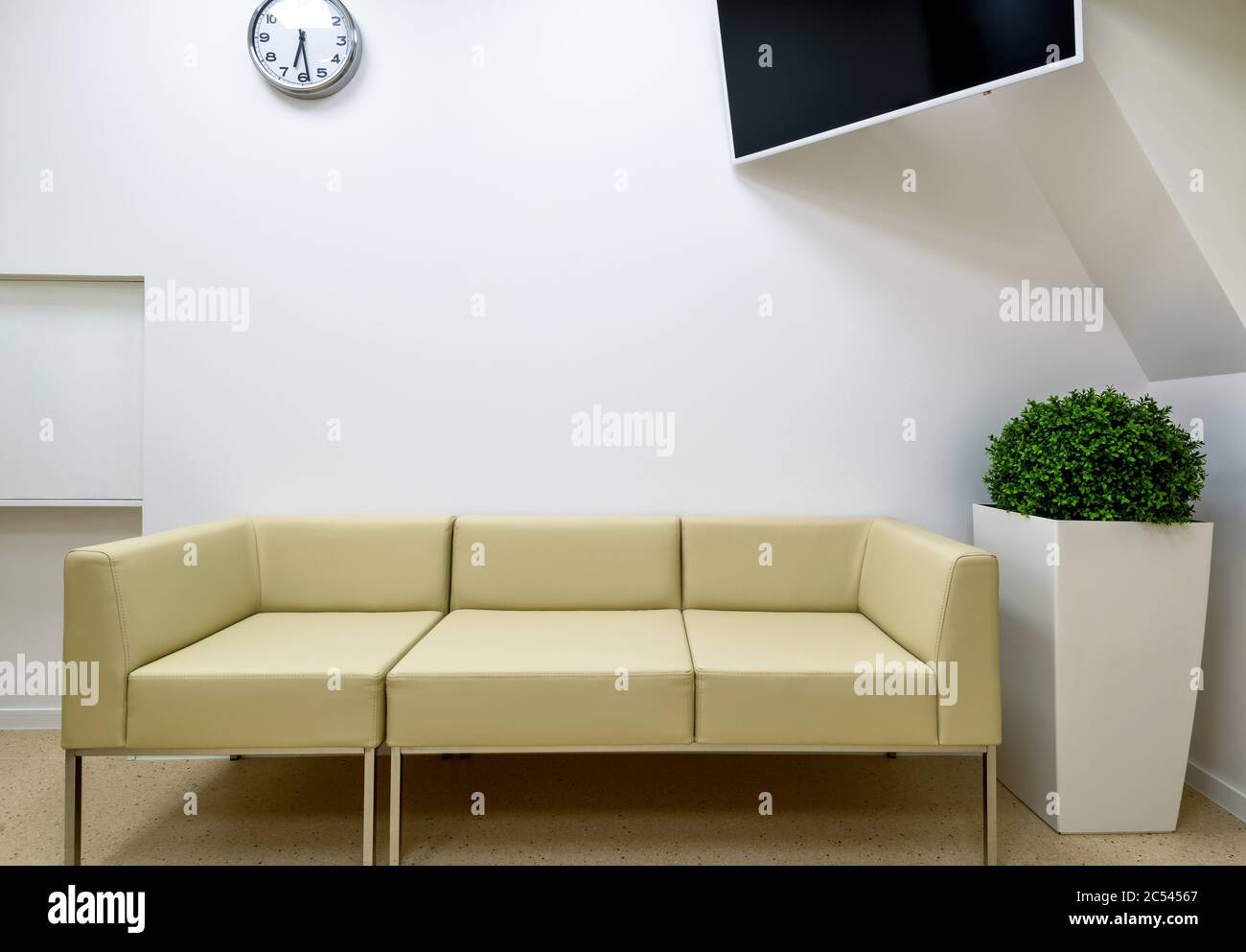 Modern office or clinic interior, couch in hall Stock Photo