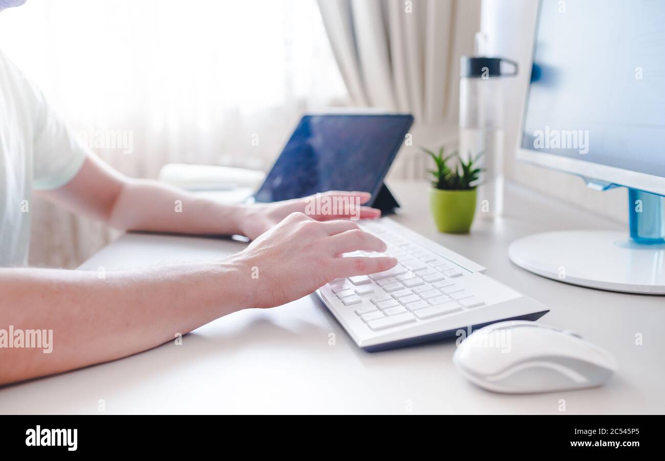 Closeup young man hands typing hi-res stock photography and images - Alamy