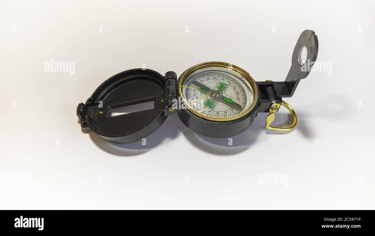 Horizontal shot of an antique compass on a white background Stock Photo ...