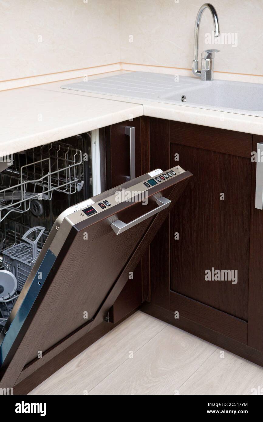 Modern dishwasher in the kitchen interior Stock Photo Alamy