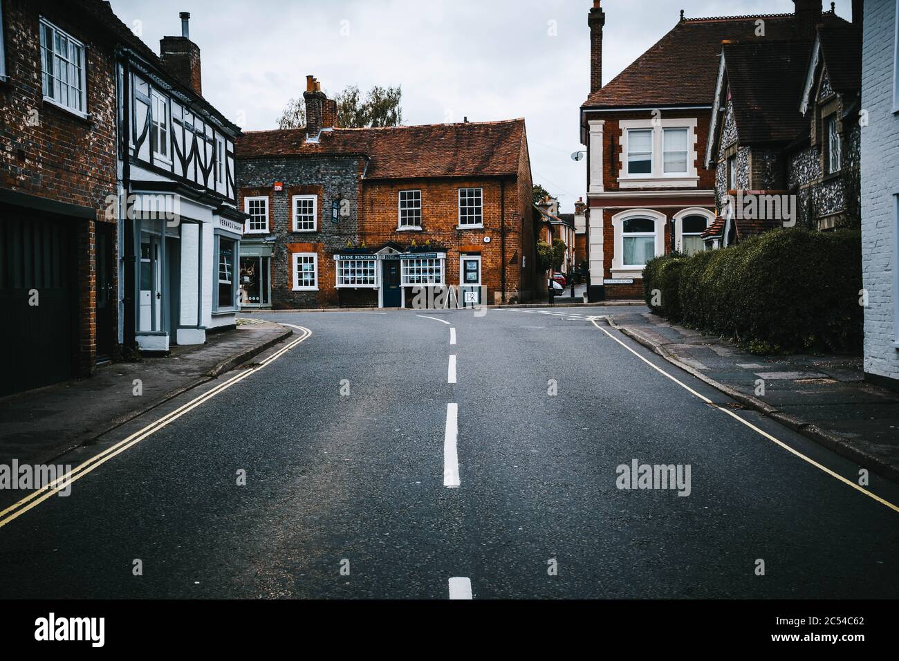 Empty street in the historic village of Wickham in Hampshire, United Kingdom on a cloudy, moody day Stock Photo
