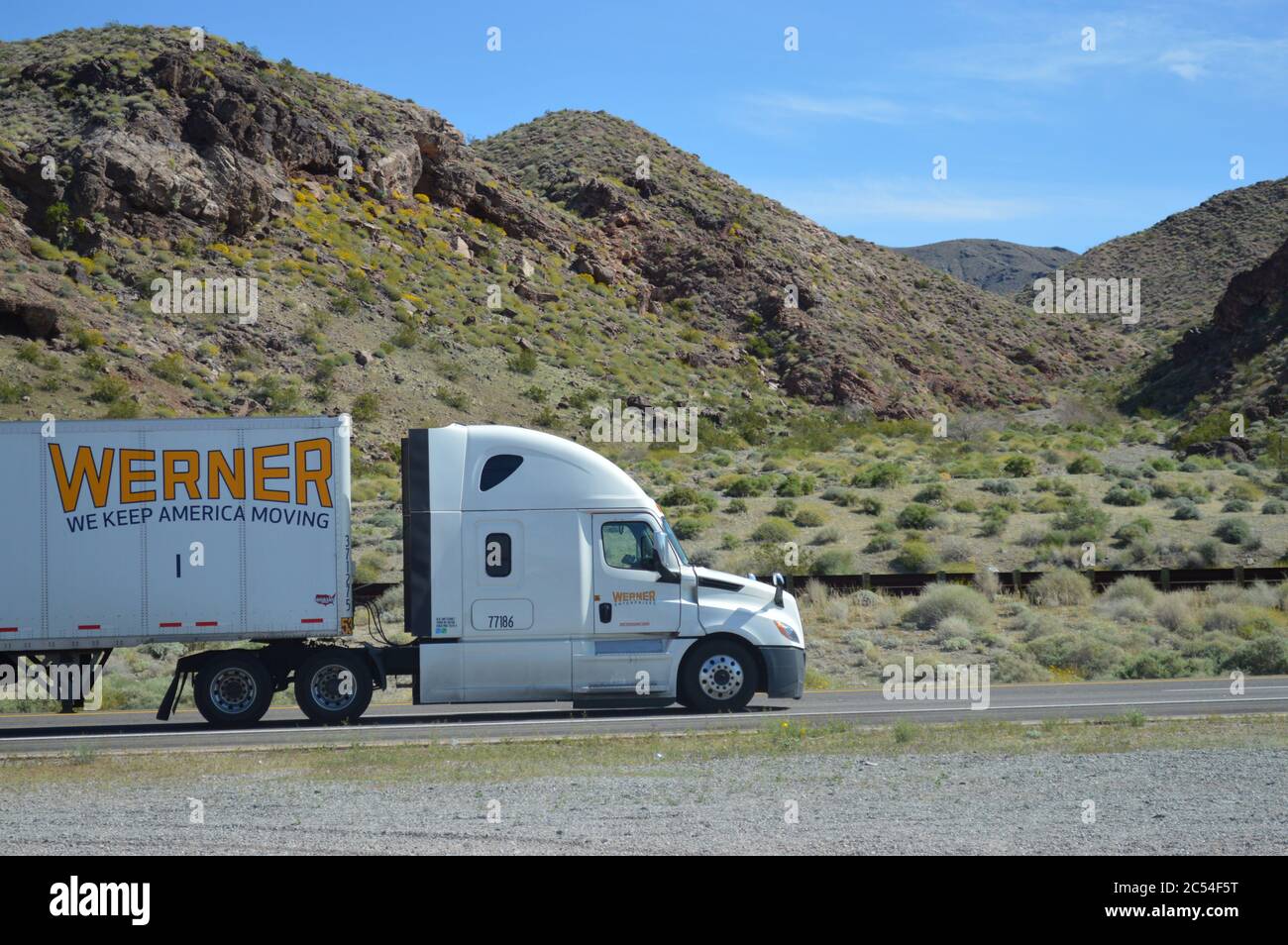 18 wheeler rolls down Interstate 40, formerly Route 66, near Needles, California Stock Photo