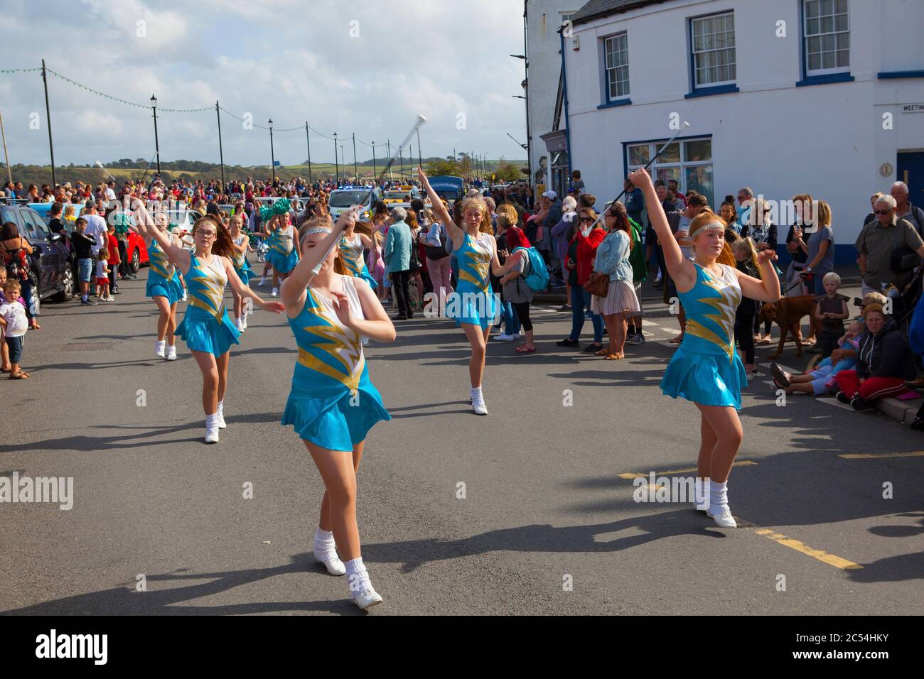 Baton twirling cheerleaders at the Appledore Carnival, August 2019 Stock Photo