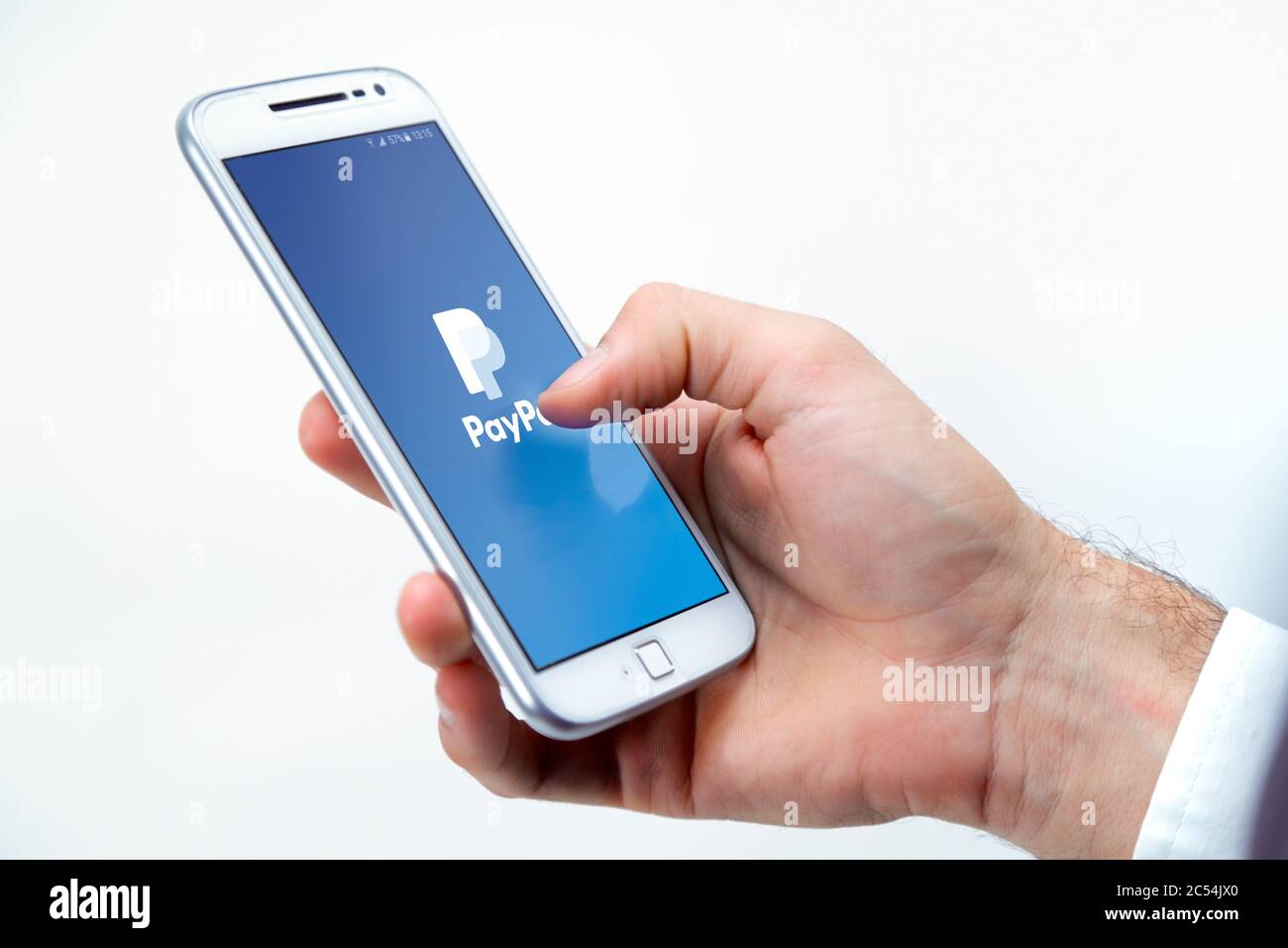 Business Man´s using Paypal on a cell phone. White background. Stock Photo