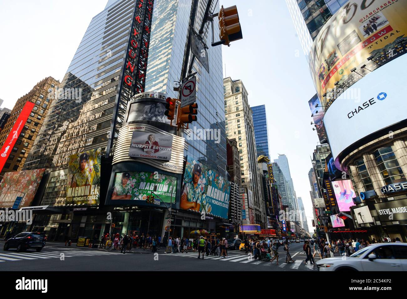 USA, New York City, Manhattan, Time square at crossing Broadway , Ernst & Young EY E&Y,  multinational company provides assurance, financial audit, tax, consulting and advisory services Stock Photo