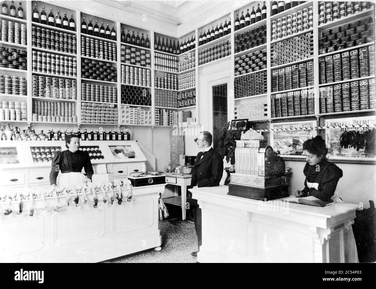 Inside view of a grocery store in Luxembourg in 1897. Stock Photo