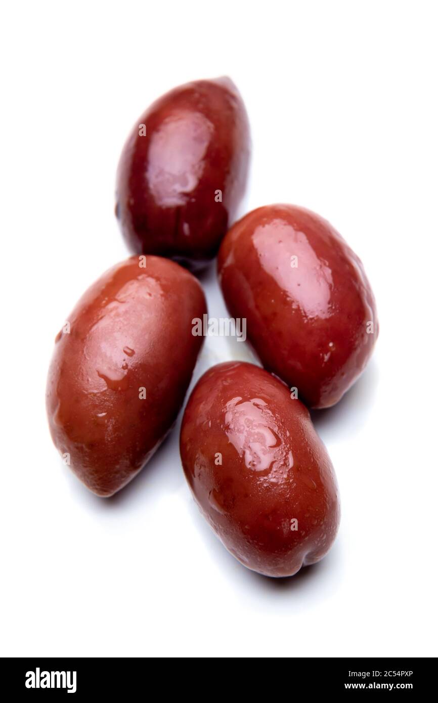 Greek kalamata pickled olives isolated on white background Stock Photo