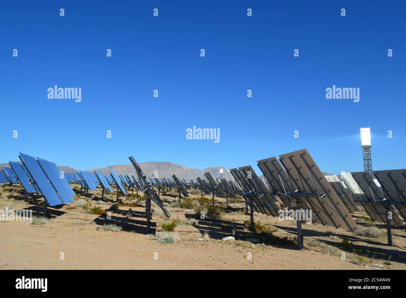 The Ivanpah Solar Electric Generating System is a concentrated solar thermal plant in the Mojave Desert. It is located at the base of Clark Mountain i Stock Photo