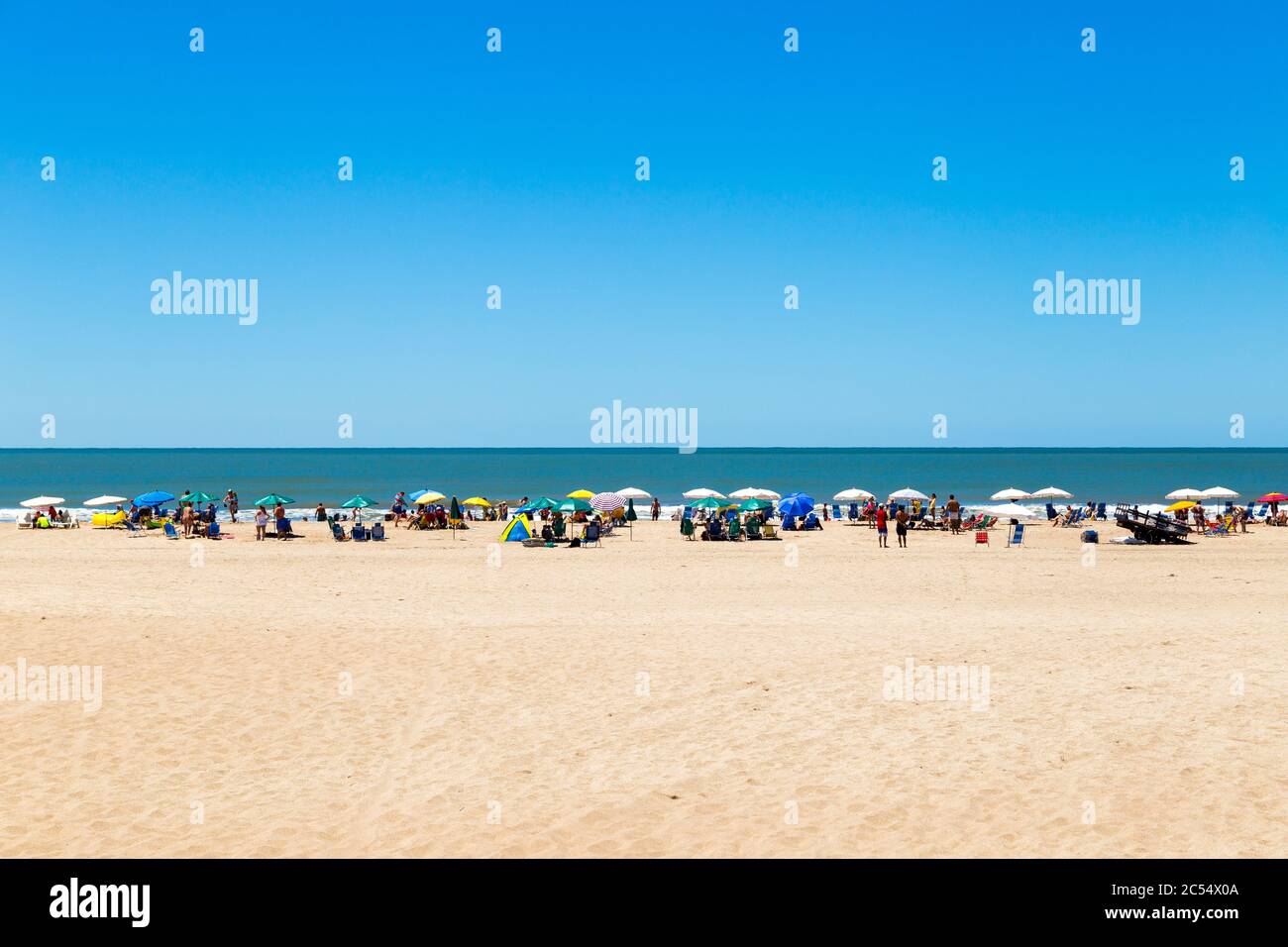 Beach life view. Flat design composition for background. Sunny day of summer at south atlantic coast. Copy space. MAR DE LAS PAMPAS,  ARGGENTINA Stock Photo