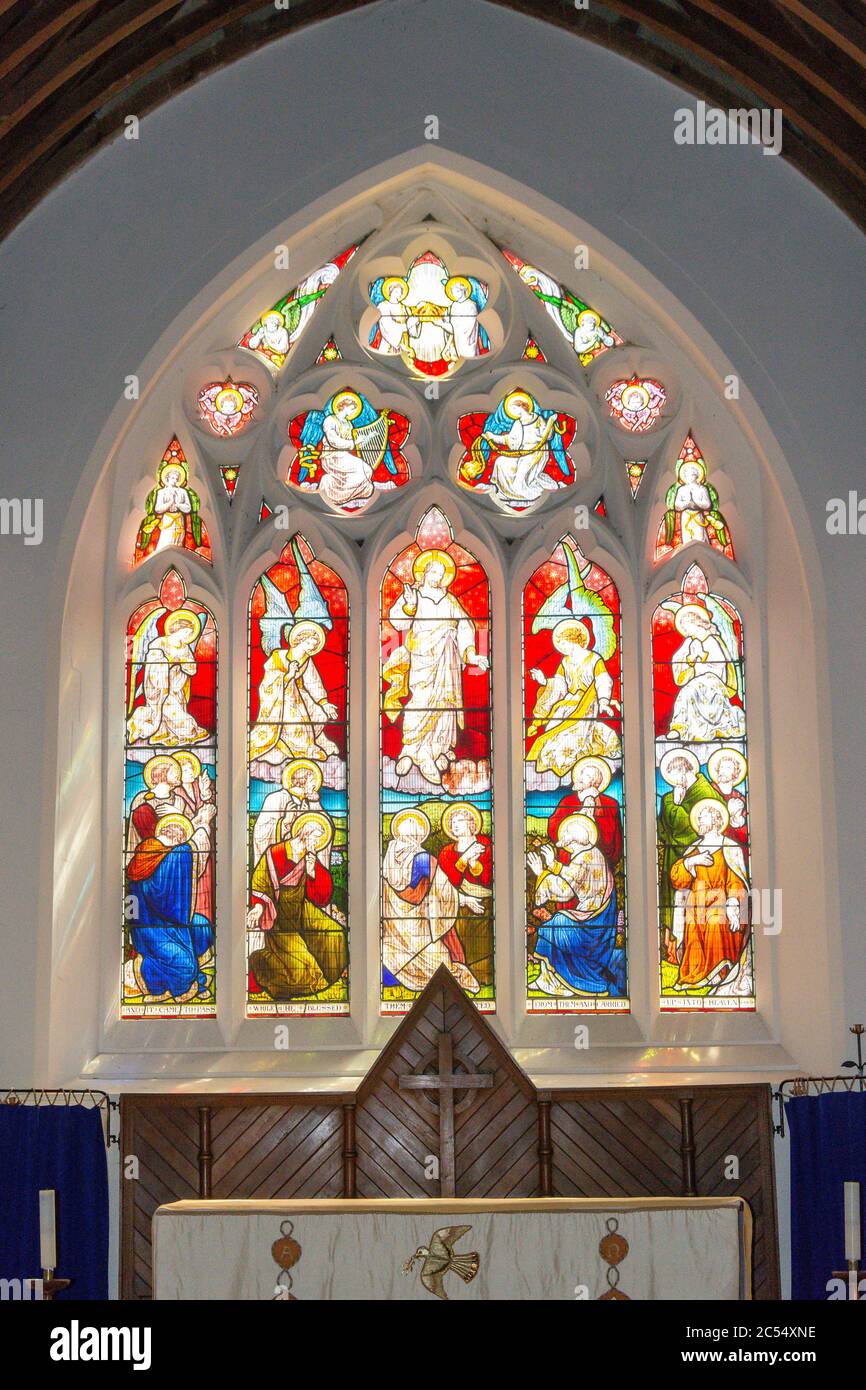 Stained-glass window above altar in St James The Greater Church, Back Street, Eastbury, Berkshire, England, United Kingdom Stock Photo