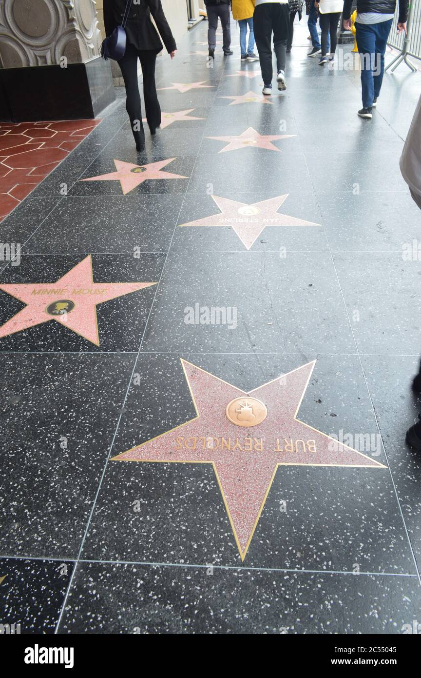 The Hollywood Walk of Fame comprises more than 2,600 five-pointed terrazzo and brass stars embedded in the sidewalks along 15 blocks of Hollywood Boul Stock Photo