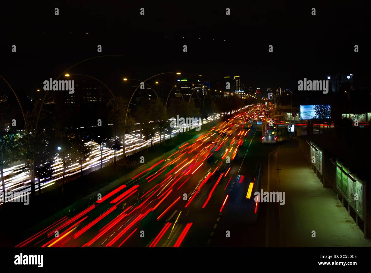 Night-time traffic in a crowded city. Stock Photo