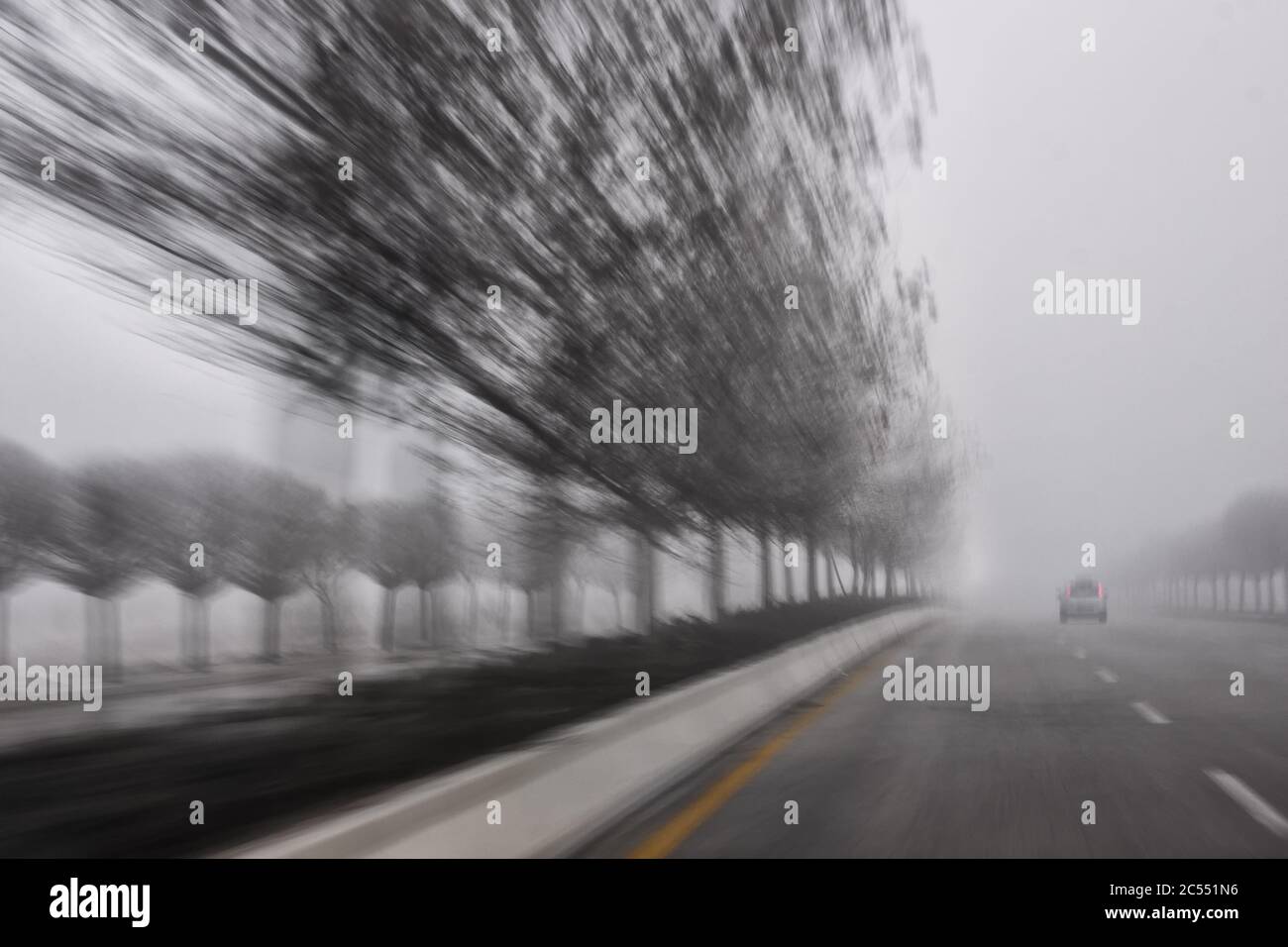 Dark foggy country road hi-res stock photography and images - Alamy