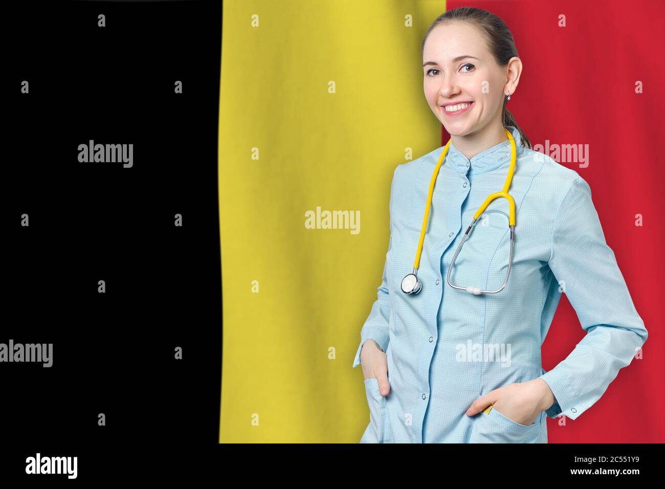 Kingdom of Belgium healthcare concept with doctor on flag background. Medical insurance, work or study in the country Stock Photo