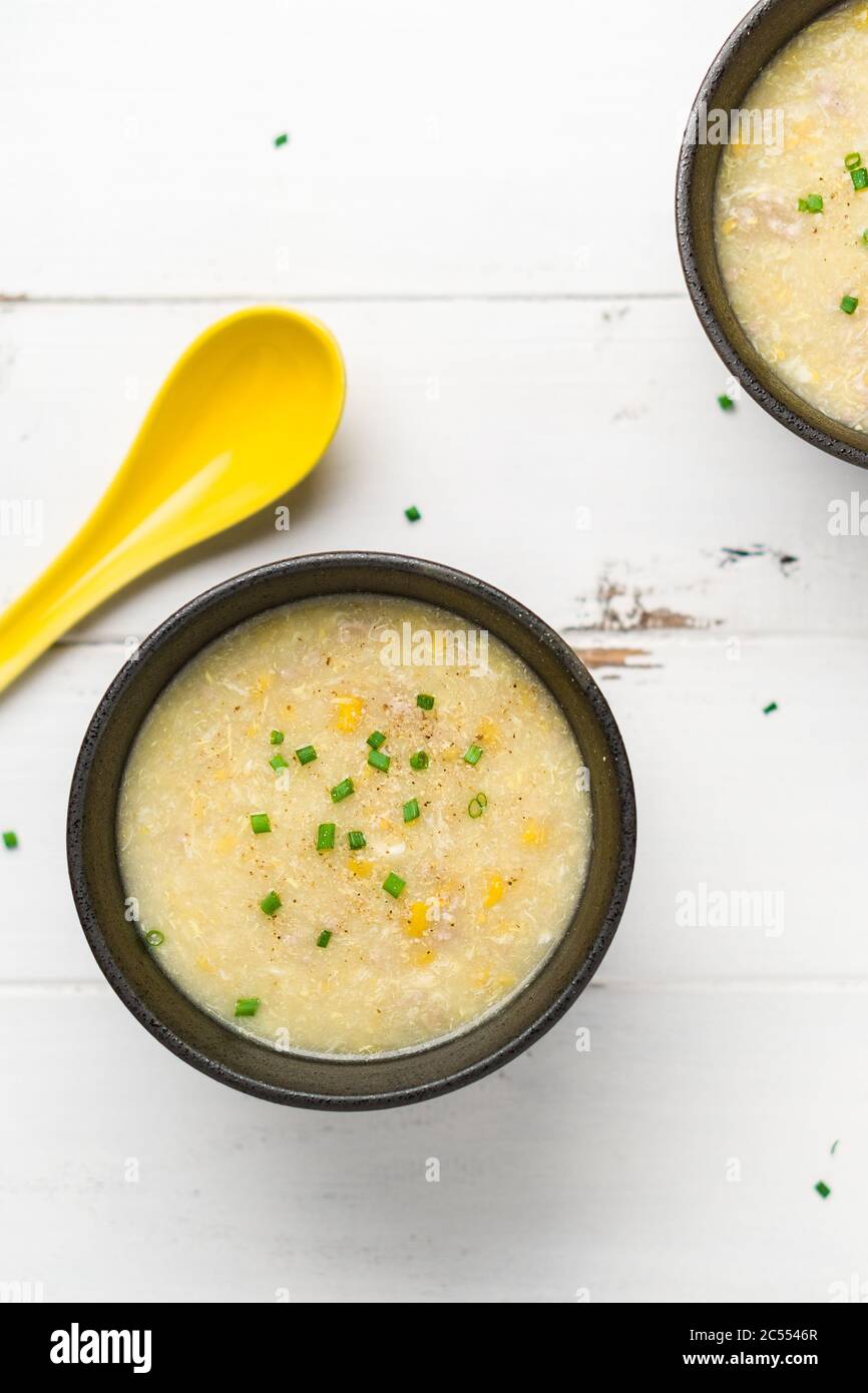 Corn soup vertical top view. A Cantonese cuisine dish often served as