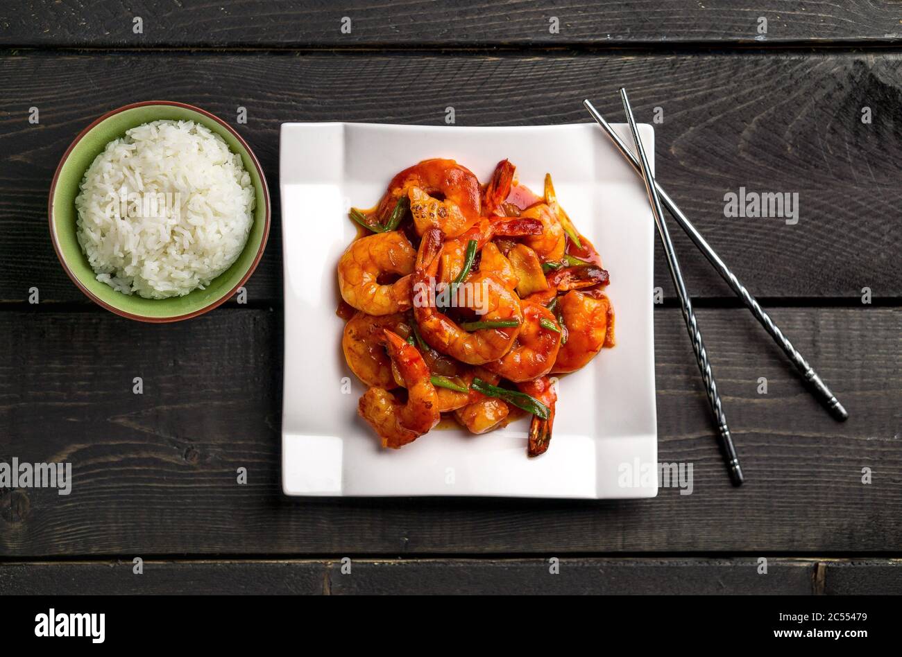 Ketchup shrimp top overhead view. Ketchup shrimp plate with bowl of
