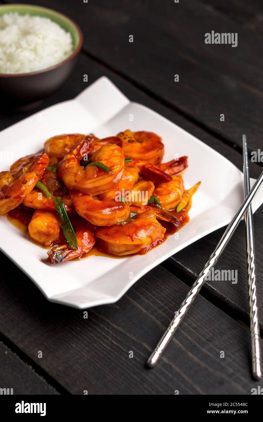 Ketchup shrimp vertical portrait view. Ketchup shrimp plate with bowl