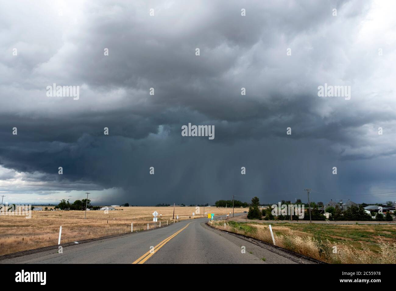 Severe thunderstorm over a field near Elk Grove California Stock Photo