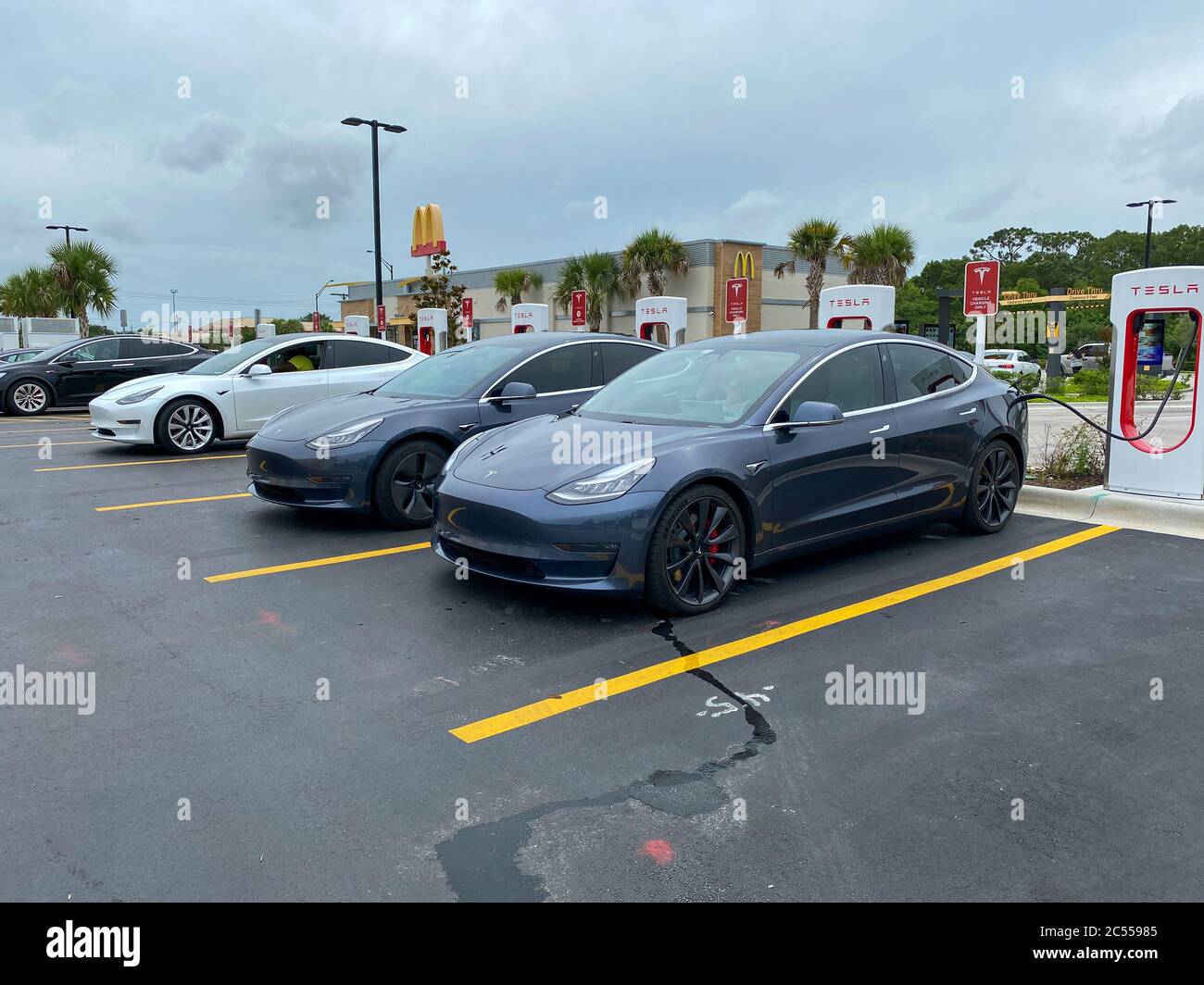 Vero Beach, FL/USA6/6/20 Cars charging at a Tesla Supercharger