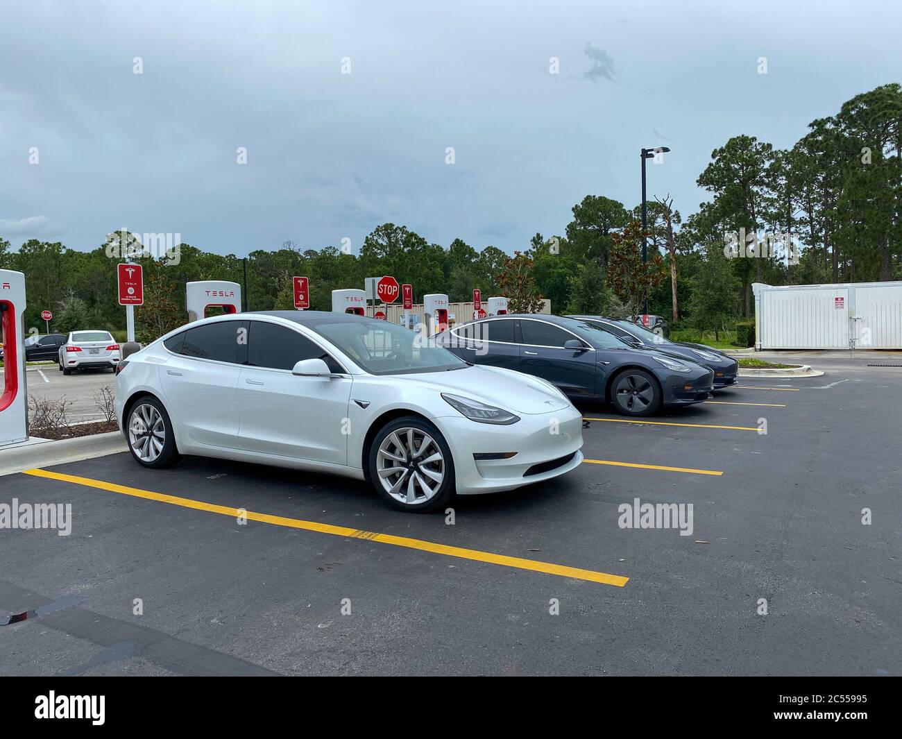 Vero Beach, FL/USA6/6/20 Cars charging at a Tesla Supercharger