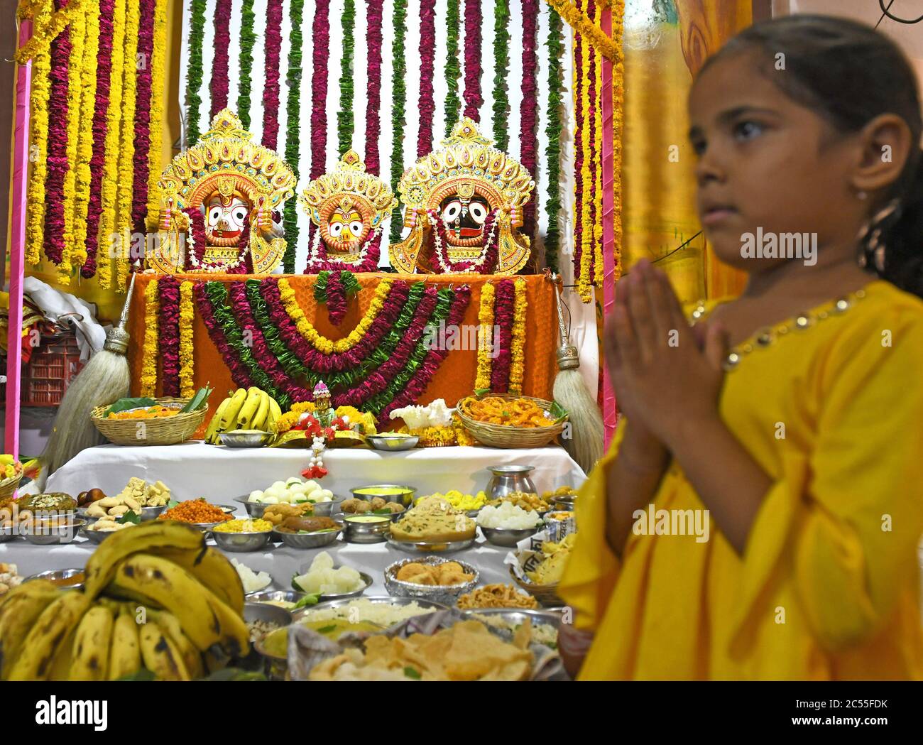 Beawar, Rajasthan, India, June 30, 2020: 'Chappan Bhog' some 56 food varieties offered in front of idol of Lord Krishna, Jagannath, Balabhadra and Goddess Subhadra decorated during the Rath Yatra festival, amid coronavirus pandemic in Beawar. Credit: Sumit Saraswat/Alamy Live News Stock Photo