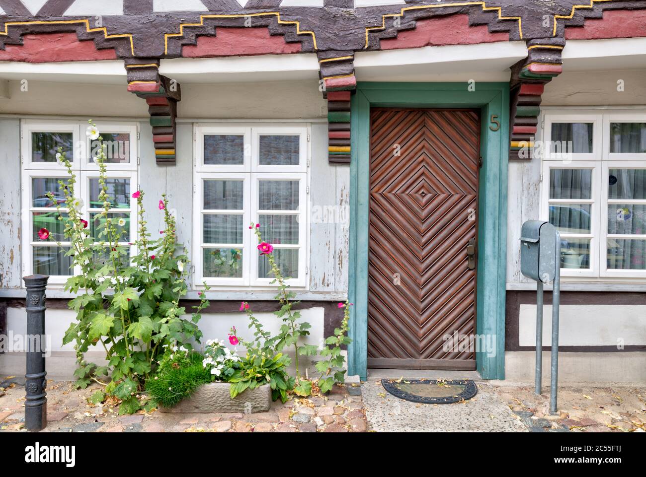 Building Part With Windows With Flower Arrangements High Resolution ...