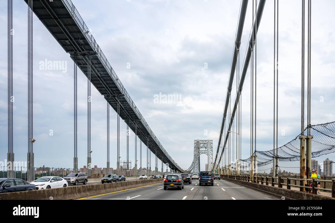 New York, USA, 28 June 2020. Vehicles drive through the upper deck of the Washington