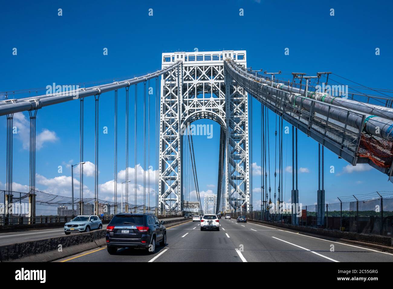 New York, USA, 28 June 2020. Vehicles drive through the upper deck of the Washington