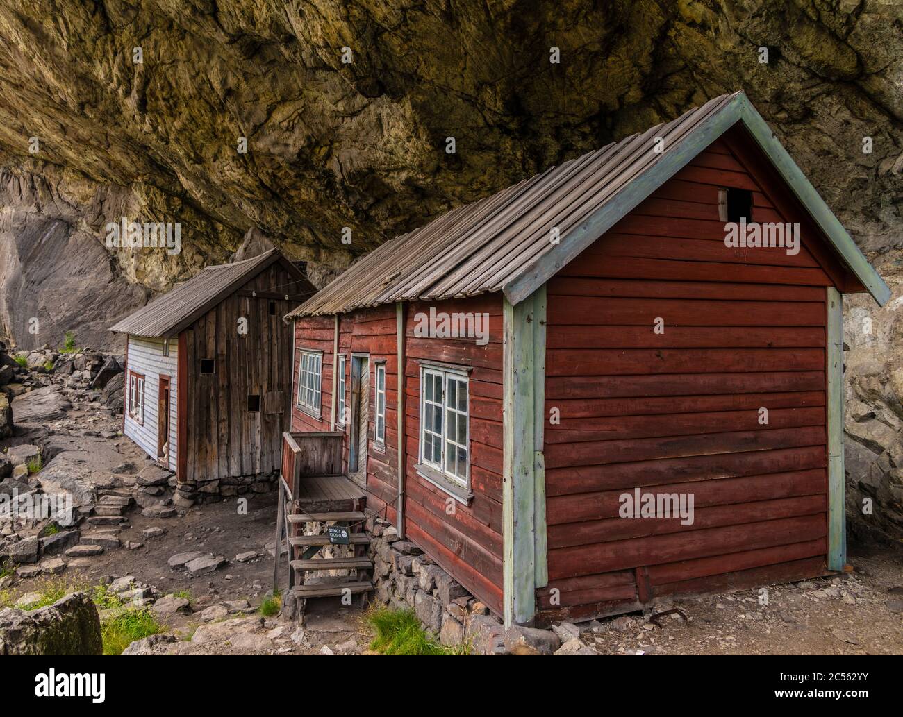 Helleren in Rogaland county where people lived until 100 years ago under that rock. Stock Photo